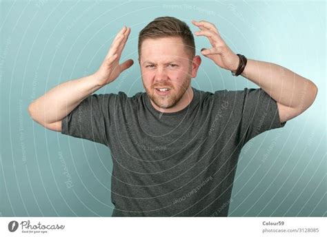 Frustrated man Masculine - a Royalty Free Stock Photo from Photocase