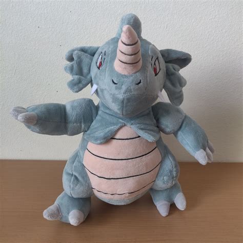 Pokemon Rhydon Plush on Mercari | Pokemon stuffed animals, Dinosaur ...