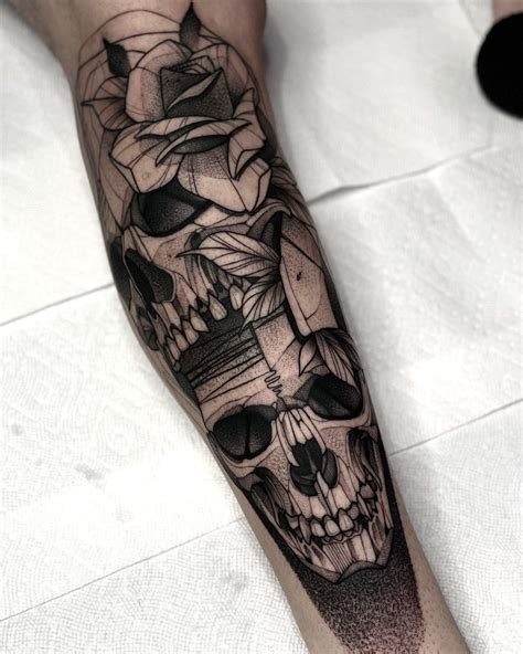 Blackwork skulls and rose tattoo done by Max LaCroix at Akara Arts in Milwaukee, WI : r/tattoos