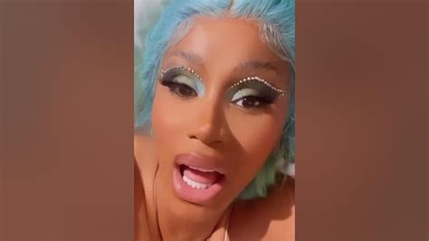 Cardi b blue hair - YouTube