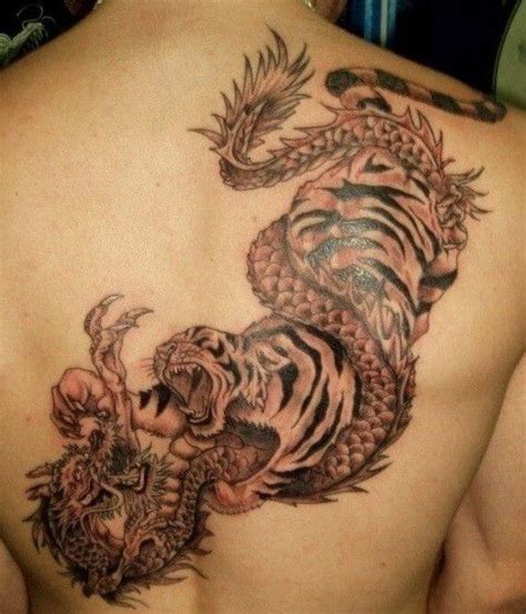 Top 67+ dragon and tiger tattoo meaning latest - in.coedo.com.vn