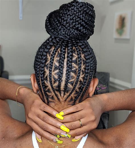 Pearl Ransome on Instagram: "The small feed-in bun (DOUBLE DESIGN). 💛💛" | African hair braiding ...