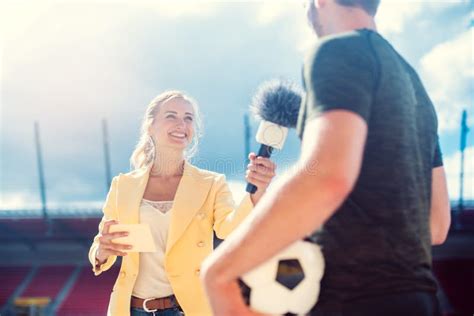 Reporter Interviewing Football Player in a Stadium Stock Photo - Image of people, match: 196907764