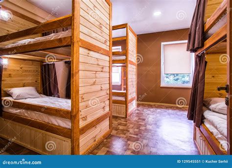 Bunk Wooden Beds in the Comfortable Hostel Stock Image - Image of double, lamp: 129545551