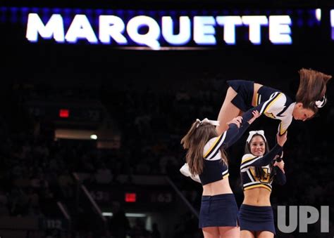 Photo: Marquette Golden Eagles cheerleaders at the NCAA Big East Men's ...