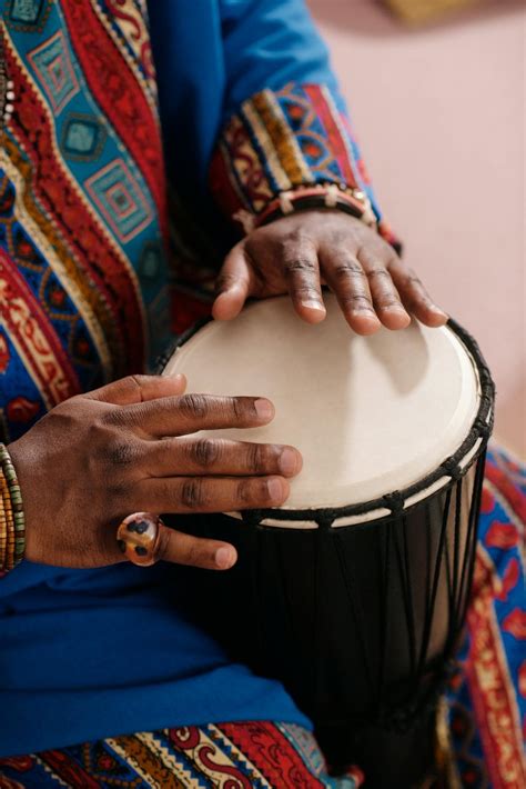 Photo Of Person Playing Djembe · Free Stock Photo