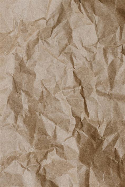 Download Caption: Aesthetic Crumpled Brown Cardboard Paper Wallpaper | Wallpapers.com