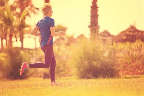 young female runner training for marathon 11915138 Stock Photo at Vecteezy