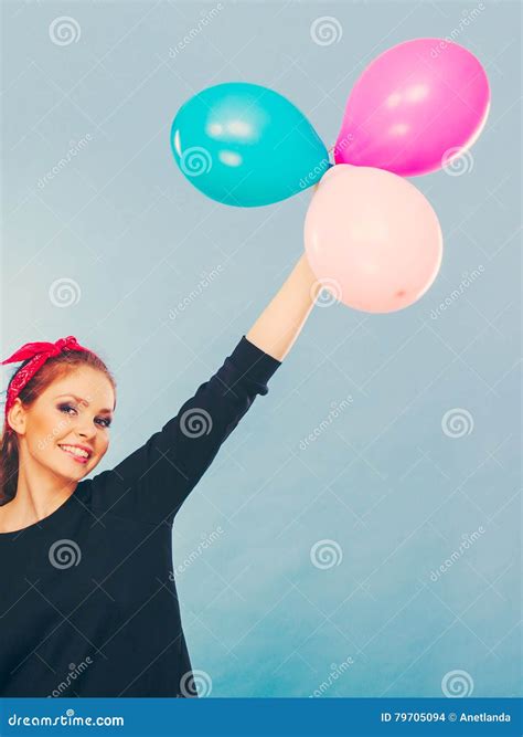 Lovely Smiling Girl Holds Colorful Balloons. Stock Photo - Image of joyful, balloons: 79705094