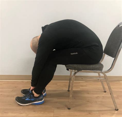 Back Pain? 7 Stretches You Can Do From Your Desk Chair – SweatNET