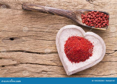 Achiote grains and powder stock photo. Image of seasoning - 105330208