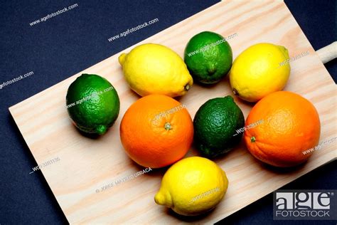 Lemons, Oranges and Limes on kitchen table, Stock Photo, Picture And Rights Managed Image. Pic ...