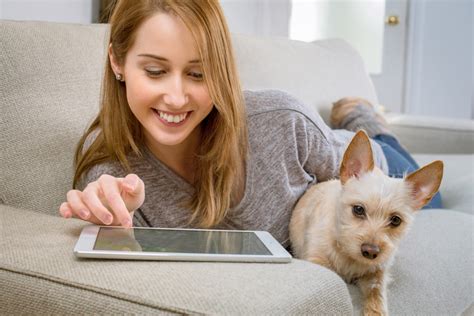 Free Images : girl, woman, puppy, tablet, relax, child, living room, activity, skin, dog like ...