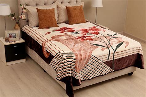 New Mink blanket. Beautifully embossed design which is soft and luxurious. Lily flower design in ...