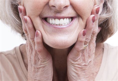 close up of older woman smiling with dentures - Duncan OK Dentist