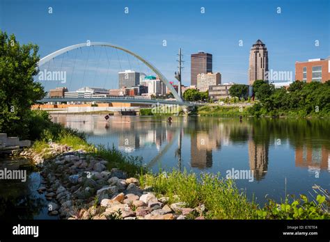 The Des Moines River and downtown pedestrian bridge in Des Moines, Iowa ...