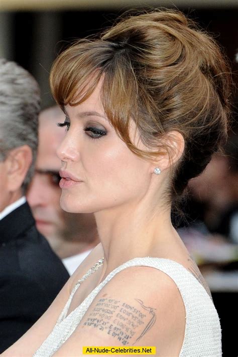 Angelina Jolie at salt premiere in Paris paparazzi shots