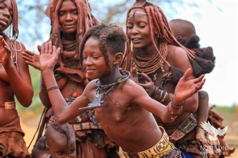 A Young Himba Girl Dancing Ondjongo, Namibia | Himba people, Himba girl ...