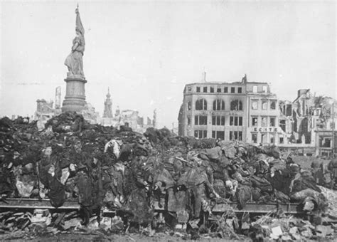 A pile of bodies awaits cremation after the bombing of Dresden, 1945 ...