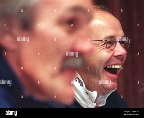 England Rugby manager Roger Uttley and coach Clive Woodward (right) give a news conference after ...