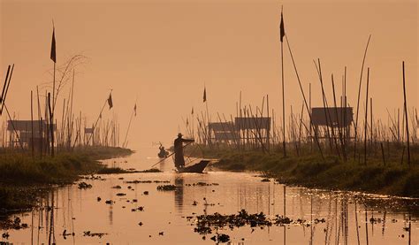 Fishermen On Inle Lake, Myanmar Photograph by Mint Images/ Art Wolfe ...