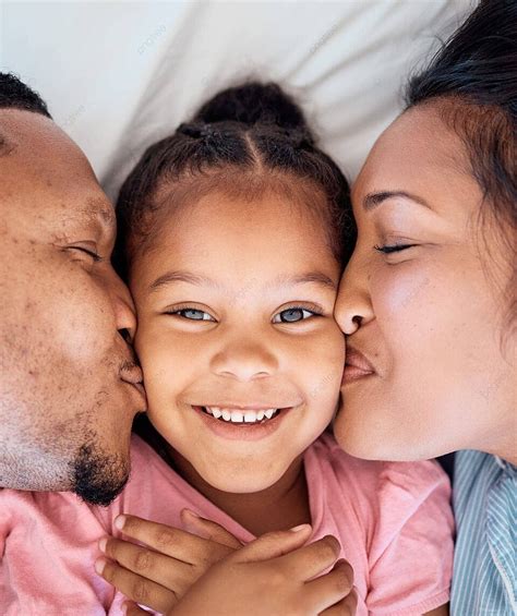 Black Family Shares Love And Happiness In Bed Photo Background And ...