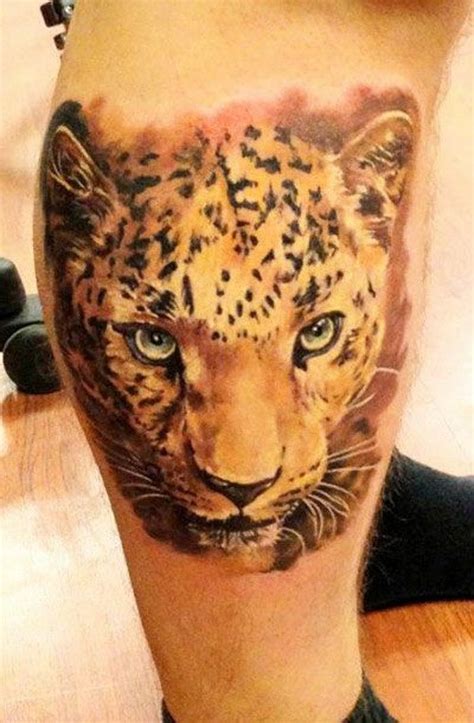 Awesome color-ink cheetah head tattoo on shin - Tattooimages.biz