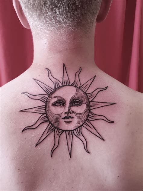 Get inked with a mesmerizing traditional sun face tattoo – Click Here to learn more!