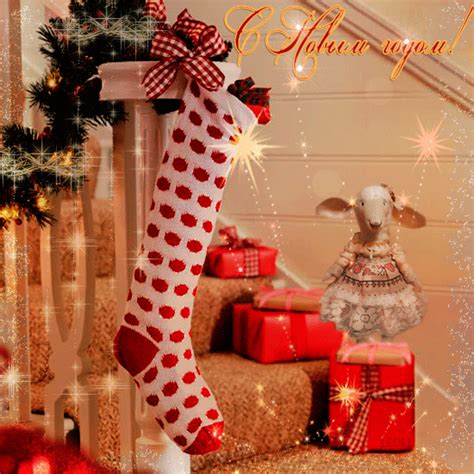 a christmas stocking with red and white polka dots on it next to some ...