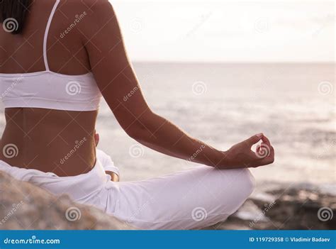 Woman Meditating in a Yoga Pose on the Beach Stock Photo - Image of life, hand: 119729358