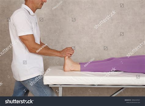 Physiotherapist Massaging Achilles Tendon Female Paitient Stock Photo 1806244501 | Shutterstock