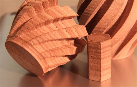 3D printer improvements: Shades of brown with wood filament, via varying temperature