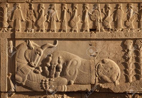 Combat of lion vs bull carved on the staircase wall of Persepolis Site ...