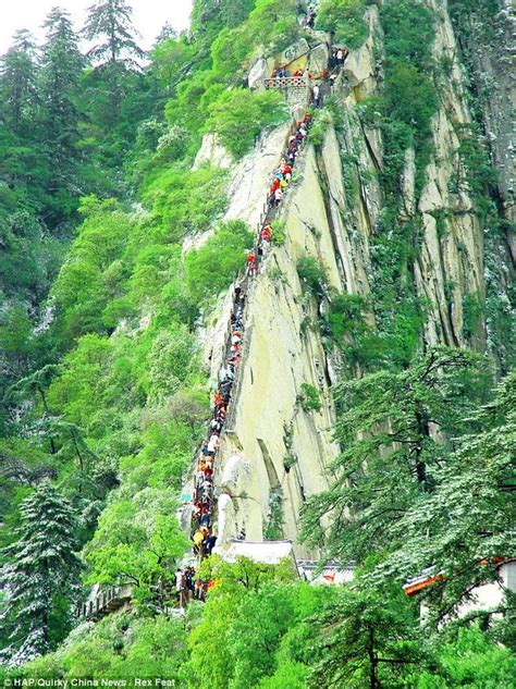 What could possibly go wrong? The tourist trek thousands of feet up a Chinese mountain along ...