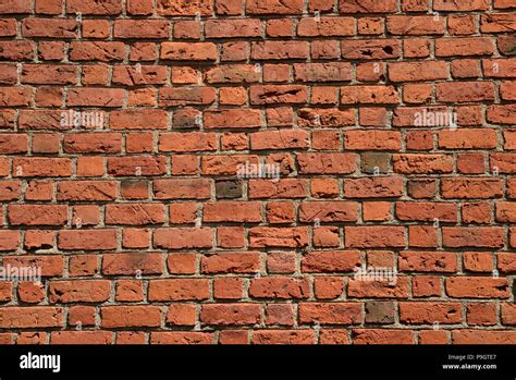 Red brick city wall texture and background Stock Photo - Alamy