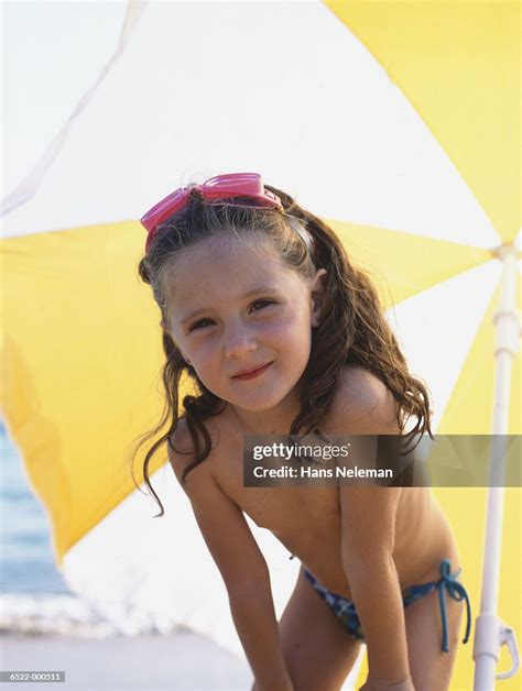 Girl On Beach High-Res Stock Photo - Getty Images