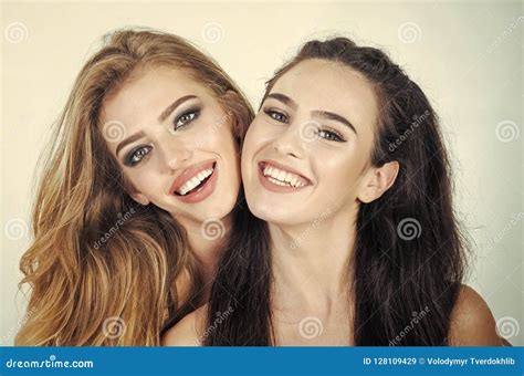 Two Young Girl Friends Standing Together Stock Image - Image of healthy, erotic: 128109429