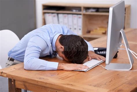 Its Too Much. Cropped Shot of a Businessman Banging His Head on the Desk. Stock Photo - Image of ...