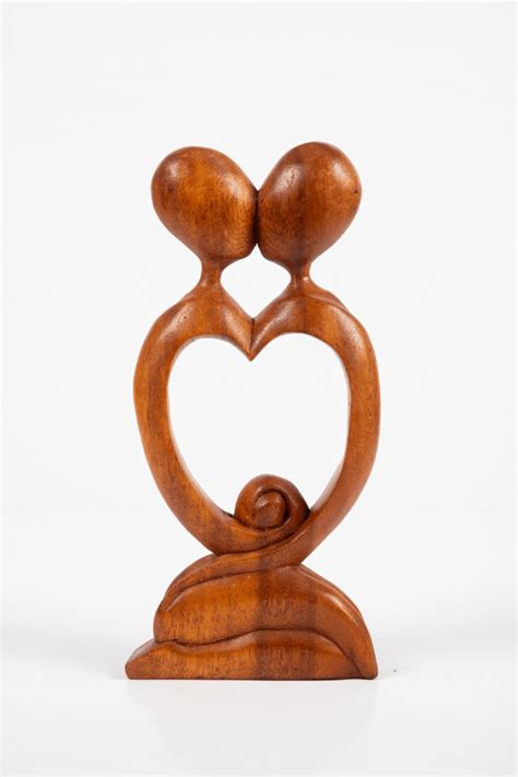 Kissing Carved Wooden Sculpture · Mexicali Blues