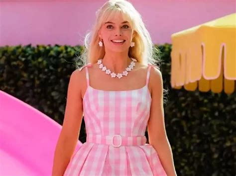 Margot Robbie opens up about her childhood and reveals she wasn't a big Barbie doll fan ...