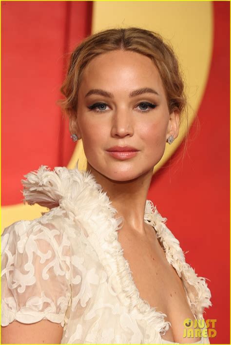 Jennifer Lawrence Goes Sheer, Wears Vintage Dress With Long Train to Oscars 2024 Afterparty ...