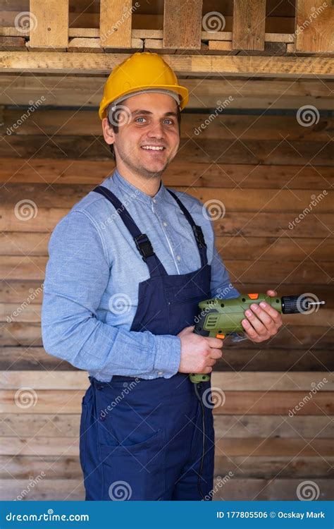 Handsome Craftsman Holding Electric Drill Stock Photo - Image of business, construction: 177805506