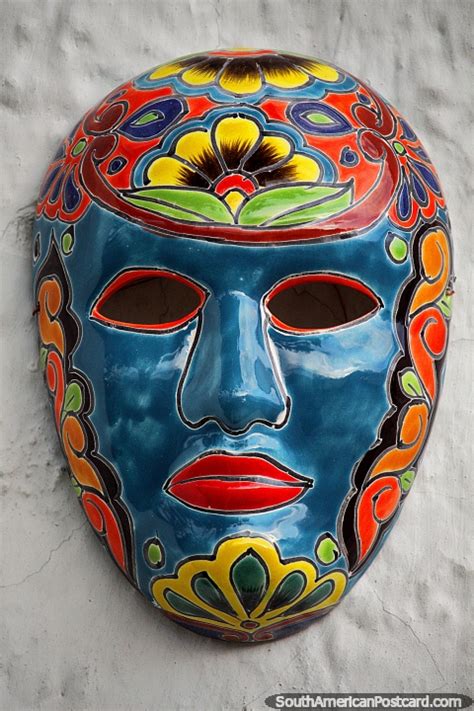 Blue ceramic mask outside the bullfighting ring in Guatavita. Photo from Colombia, South America ...