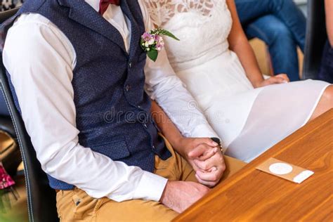 Young Married Couple Holding Hands during Ceremony Wedding Day Stock ...