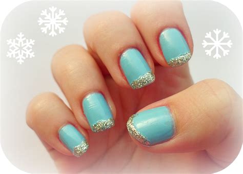 Blue Nails With Silver Glitter French Tip Design