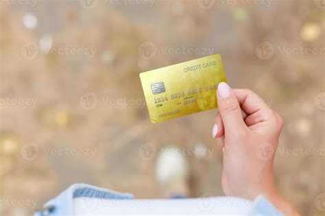 Hand holding credit card 17026877 Stock Photo at Vecteezy