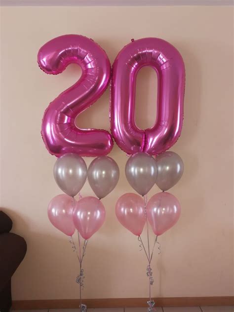 balloons are arranged in the shape of the number twenty