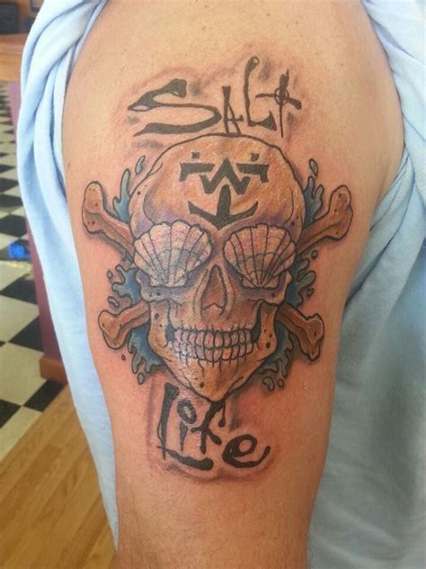 Salt Life skull and crossbones by artist Paulie Thrasher at Blue Horseshoe Tattoo in Hampton ...