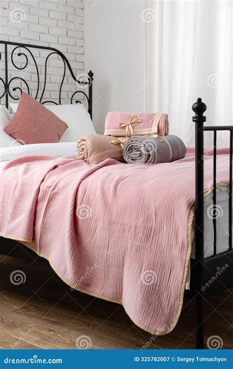 Pink Blanket on Black Metal Bed Frame in Modern Bedroom Stock Image ...