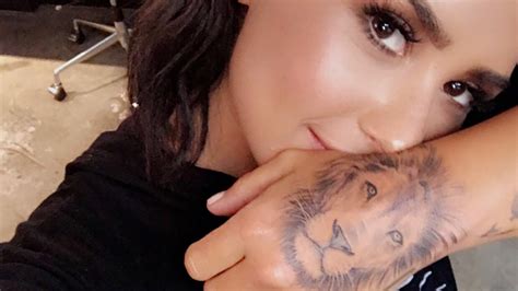 Demi Lovato Gets a Giant Lion Tattooed on Her Hand: See the New Ink! | Entertainment Tonight